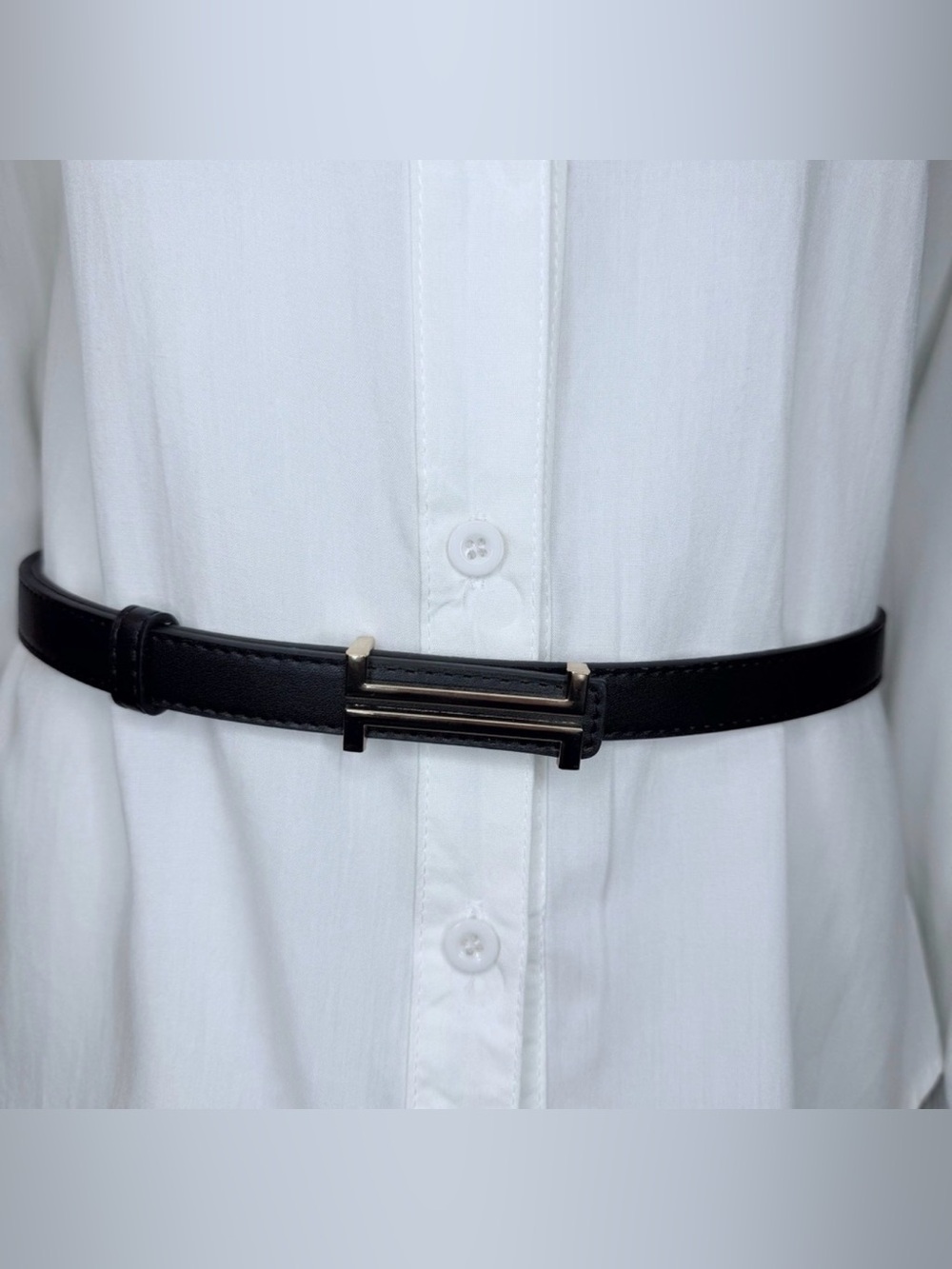 Black faux leather gold tone buckle skinny belt